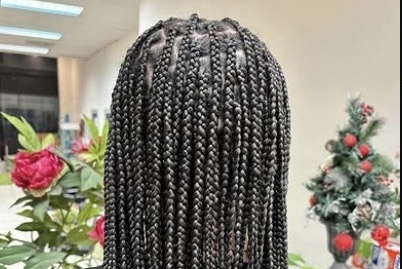 Braids styled at Misrak Beauty Salon